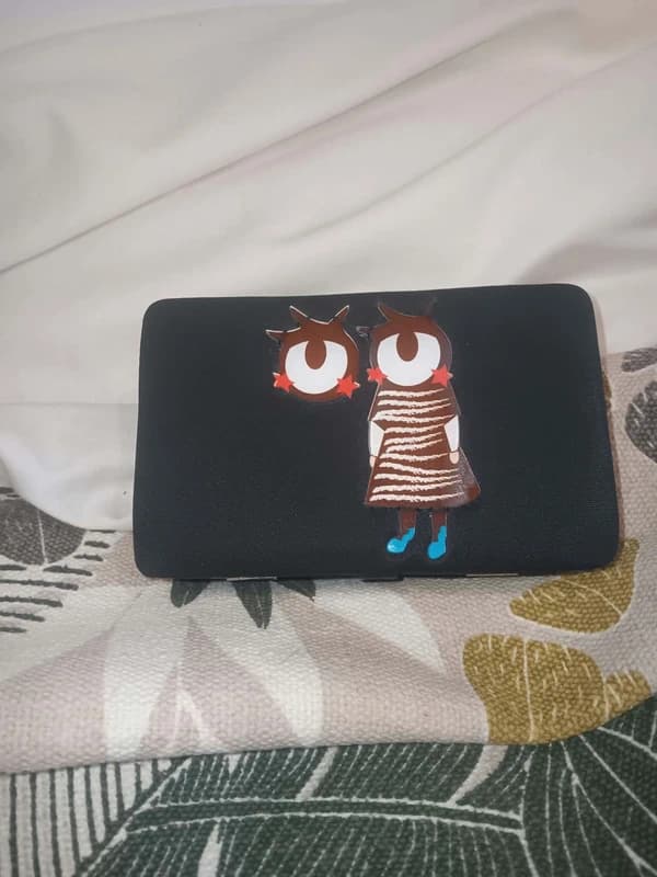 Pochette / sac de soirée Zara noir avec chaîne argentée motif personnage